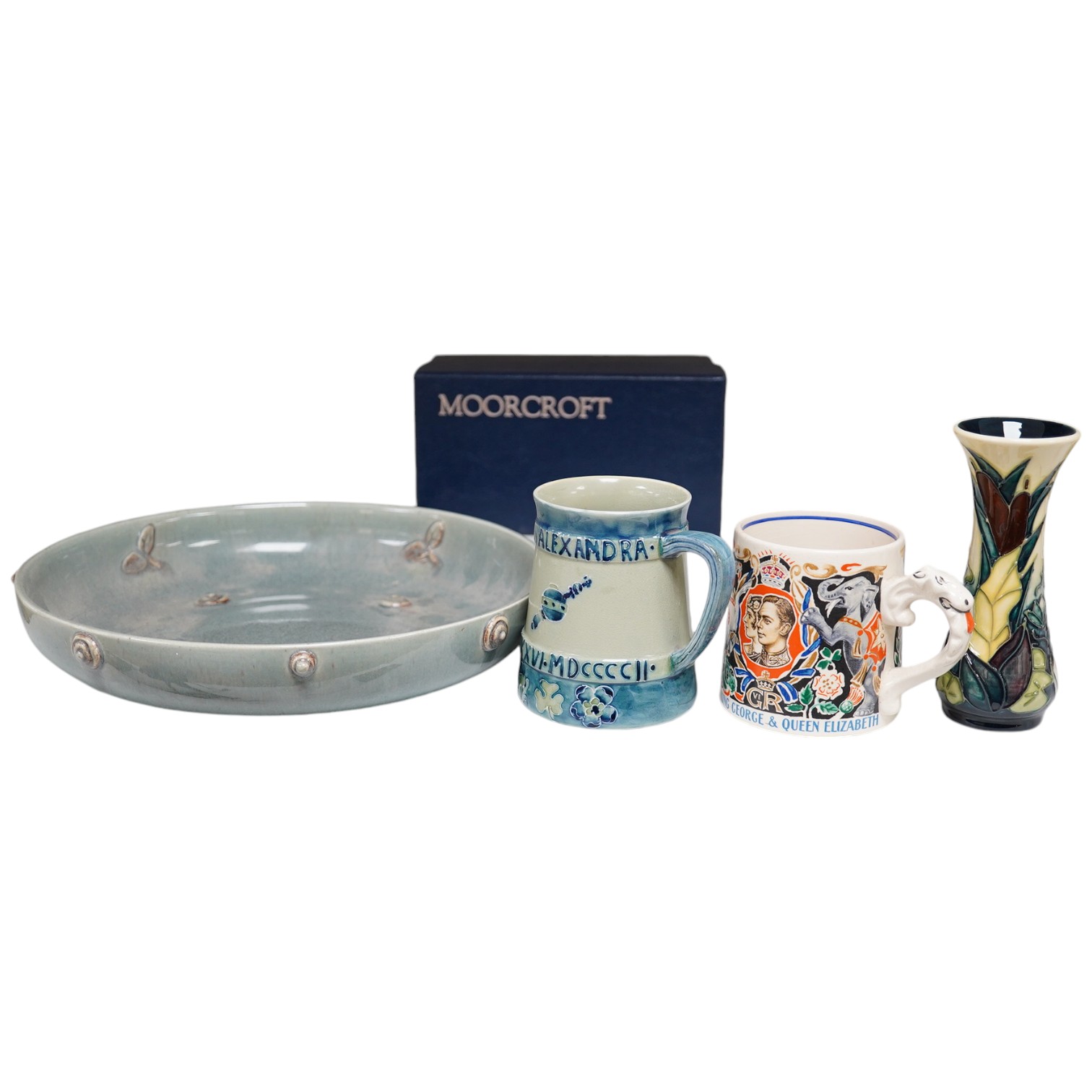 Ceramics comprising a Moorcroft mug (restored), a Dame Laura Knight mug, both Royal commemorative, Moorcroft vase and Clarice Cliff dish, largest 26cm in diameter. Condition - varies